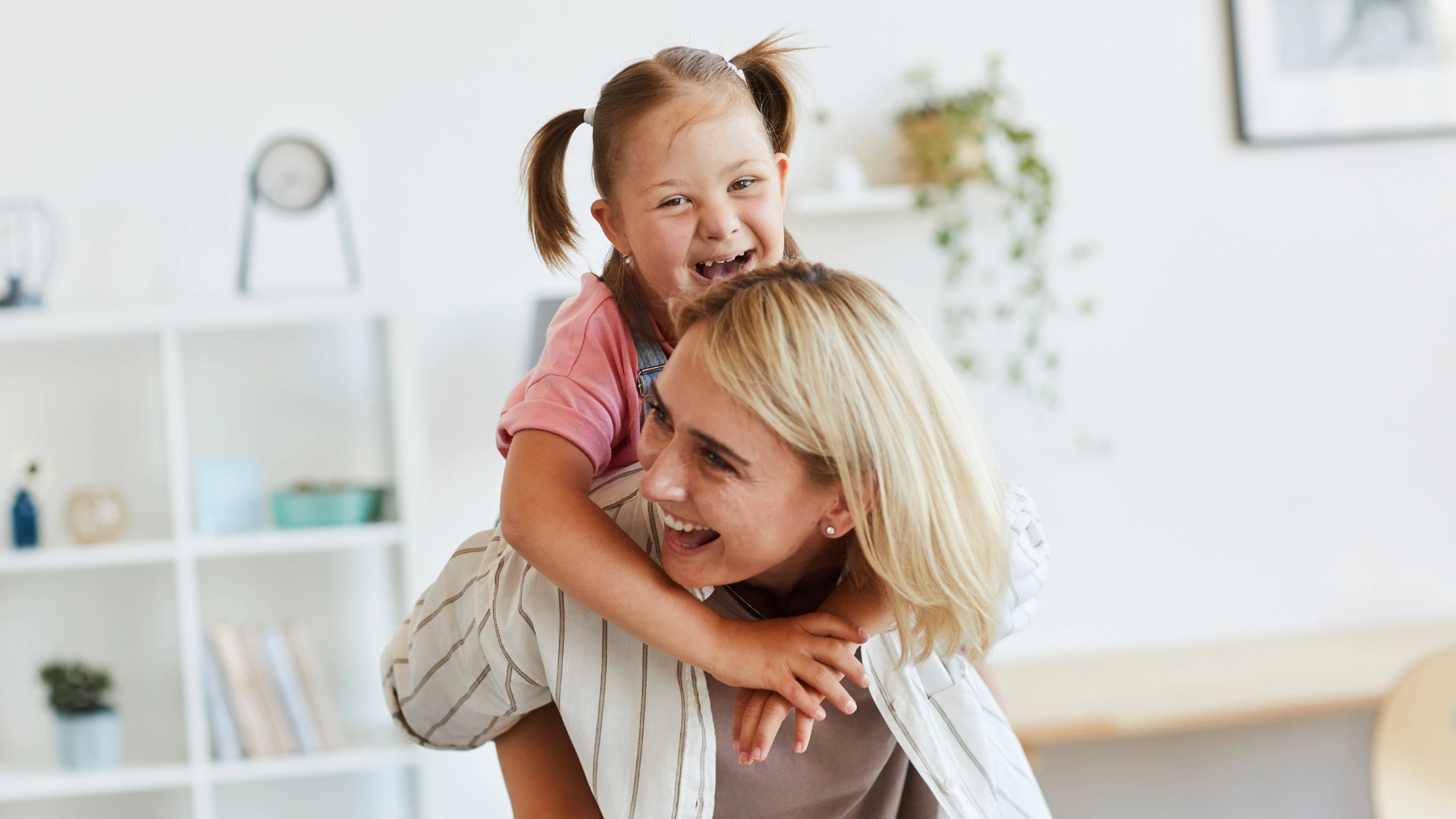 Mother and daughter laughing together in a clean New Tampa home